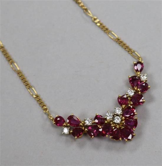 An 18ct gold, ruby and diamond set necklace, 42cm.